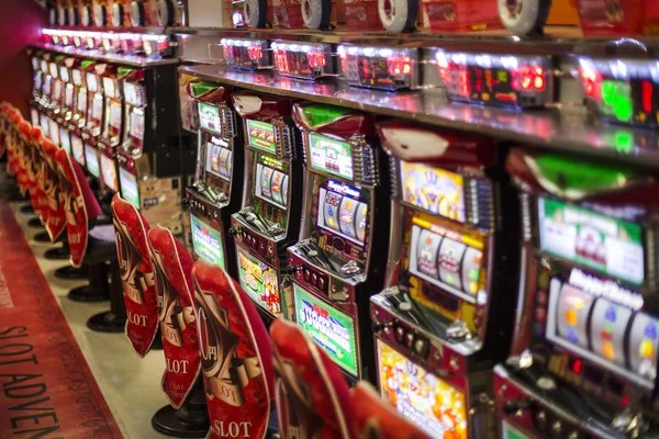 Slot game interface showing spinning reels and payout symbols